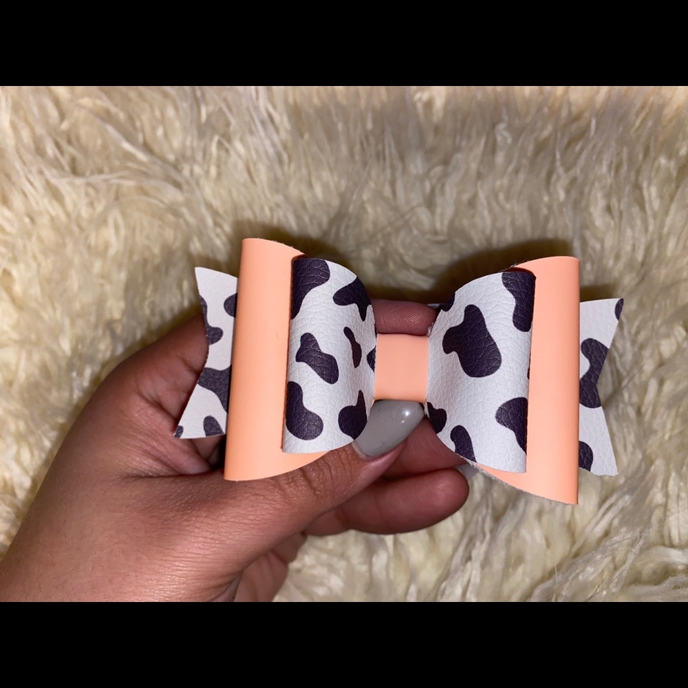 Glow in the dark Cow print and coral bow